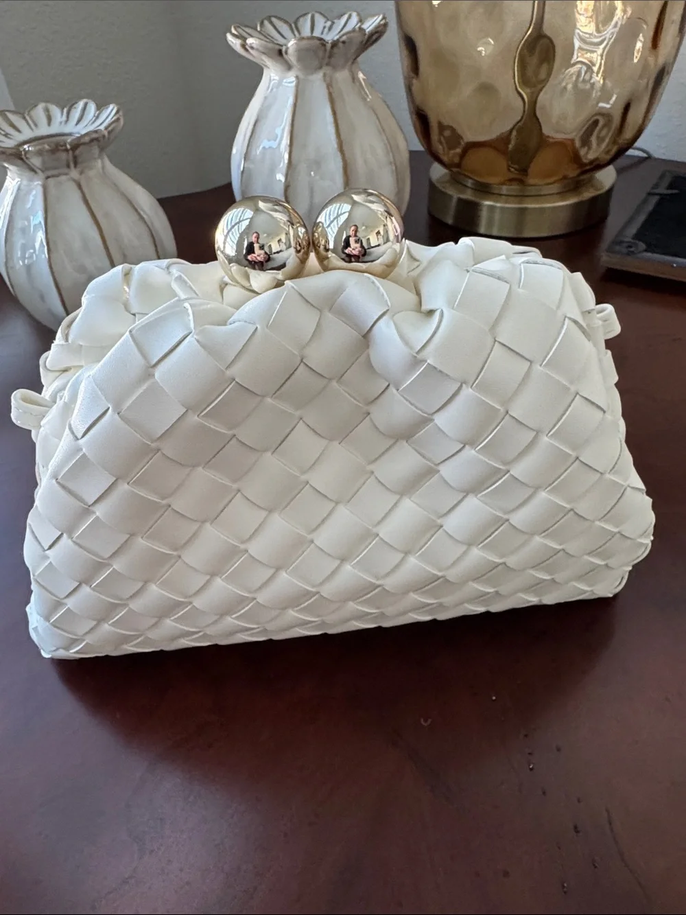 Elegant White Woven Clutch with Gold Accent